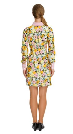 SALE! 2 left! Vibrant Floral Autumn Shirt Dress; a versatile and delightful addition to your wardrobe. This dress features a vibrant floral pattern that adds a casual elegance to your ensemble, making it perfect for both work and play. The classic pink collar, cuffs, and button down detailing provide a charming contrast against the floral backdrop. With its casual yet sophisticated style, this dress carries confidently across all environments, from the classroom to a concert hall. Embrace the vi Multicolor Long Sleeve Floral Printed Dress, Multicolor Long Sleeve Printed Floral Dress, Multicolor Long Sleeve Floral Dress, Multicolor Printed Long Sleeve Floral Dress, Multicolor Long Sleeve Floral Dress For Garden Party, Spring Floral Long Sleeve Dress For Daywear, Multicolor Collared Dress For Daywear, Long Sleeve Cotton Mini Dress For Garden Party, Long Sleeve Floral Dress For Spring Daywear