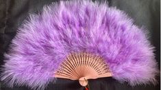 Beautiful feather hand fan in purple. Great accessory for any occasion. Feather Hand Fan, Purple Quinceanera, Purple Quinceanera Dresses, Half Gloves, Clear Umbrella, Gatsby Theme, Gorgeous Prom Dresses, Fan Decoration, Purple Feather