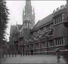 an old black and white photo of some buildings