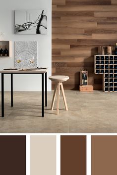 a dining room with wood paneled walls and flooring in shades of brown, beige, and white