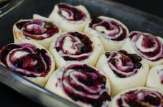 there are many rolls in the pan ready to be eaten