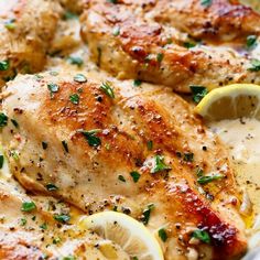 chicken with lemons and parsley in a skillet