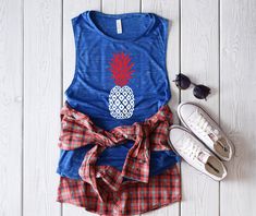 4th of july pineapple shrit, usa tank, fourth of July tank, patriotic tank, memorial day tank, 4th of July shirt, red white blue tank *T- SHIRT INFO* A fashion-forward tank in a super soft and flowy poly-viscose blend. The cropped and boxy silhouette, round neck and elongated arm holes make this style perfect for layering. Offered in a variety of solid, neon and striped colors. Features: Sideseamed. Boxy fit. Cropped body length. *FABRICATION* 65% Polyester, 35% Viscose Marbles are 3.5 oz., 91/9 Red Sleeveless Tank Top With Flag Print, 4th Of July Sleeveless Flag Print Top, Patriotic Blue Tops For Summer, Blue Patriotic Tops For Summer, Red Tank Top With Flag Print For Summer, Blue Patriotic Summer Tops, Red Flag Print Tank Top For Summer, Sleeveless Flag Print Tops For 4th Of July, White Sleeveless Tank Top For 4th Of July