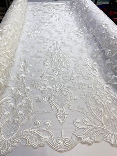 Bridal Ivory Tulle Fabric  Embroidery lace, Off-White wedding dress Lace fabric by the yard This lace fabric is perfect to make your  wedding dress, and also can be used for formal and special occasion wear such as prom dresses, bridesmaid dresses and mother of the bride and much more. Width  : 135 Centimeters / 53 inches Choice of Lengths Shipment of the order within 1 to 2 business days, Shipped by express - (2-4 business days to Europe and UK, 3-5 business days to the USA and 4-8 business day Sequence Fabric, Beaded Fabric, White Lace Wedding Dress, Fabric Stains, Beaded Lace Fabric, Bridal Fabric, Fabric Embroidery, African Lace, Wedding Etsy