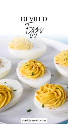 deviled eggs on a white plate with the words deviled eggs