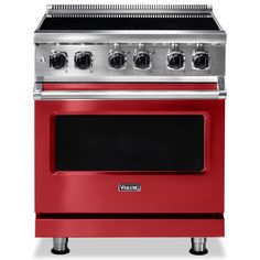 a red stove with four burners and two oven doors on each side, in front of a white background