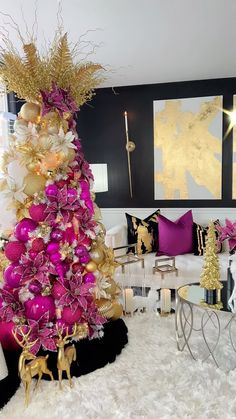 a living room with a christmas tree decorated in pink and gold ornaments, surrounded by white fluffy rugs