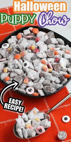 a bowl filled with halloween puppy chow next to a spoon