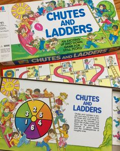 two children's board games sitting on top of each other