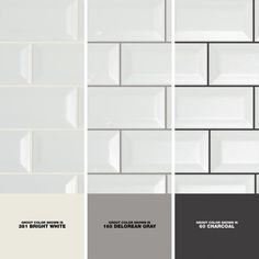 some white and gray tiles with different colors on the wall in this color scheme, there is