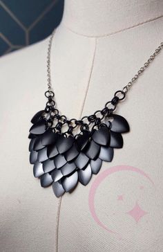 A stunning black to white gradient necklace made from premium satiny Anodized aluminum scales. The finish on these scales is beautiful and the necklace is so light and easy to wear it can add a stunning fantasy-inspired finish to almost any outfit. White Gradient, Dragon Scale, Black Dragon, Anodized Aluminum, Pendant Necklaces, Favorite Jewelry, Halloween Shopping, Necklace Etsy, Jewelry Necklace Pendant