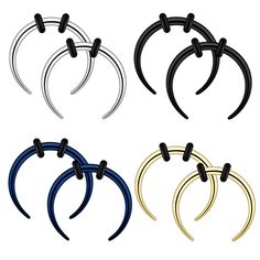 four different colored horseshoes with black and gold rings on each one, all in the same