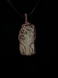 This beautiful natural petrified wood piece was found in west Texas USA . Perfect for anyone who loves nature and history of the planet .  The history this fossil has seen is baffling and the story is your's to tell. Did it grow among our ancient mammalian ancestors , or did it watch dinosaurs brawl amongst the marsh lands? This piece is raw and has not been polished or altered in any way. Take a look at some of our other fossil jewelry. Fossilized wood https://www.etsy.com/listing/1256039229/na Rustic Agate Jewelry For Healing, Handmade Rustic Agate Jewelry, Handmade Natural Wood Pendant Jewelry, Unique Natural Wood Pendant Jewelry, Earthy Hand-wrapped Natural Jewelry, Handmade Nature-inspired Natural Jewelry, Earthy Hand Wrapped Natural Jewelry, Nature-inspired Natural Stones Jewelry, Bohemian Natural Wood Necklaces As Gift