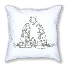 a white pillow with an image of the nativity scene