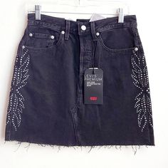 Size: 27 Condition: Nwt Button Fly High Rise Studded Accents Cut-Off Hem Non-Stretch Button Front Denim Fabric: 100% Cotton Approximate Measurements: Waist: 14" Length: 17" My Inv#B Levi's Fitted Mini Skirt, Trendy Fitted Levi's Mini Skirt, Trendy Levi's Denim Skirt, Levi's Fitted High Waist Mini Skirt, Levi's Trendy High Waist Skirt, Levi's Fall Bottoms With Buttons, Denim Patchwork Jeans, High Rise Denim Skirt, Studded Skirt