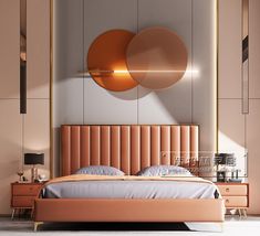 a modern bedroom with an orange headboard and two round mirrors on the wall above it