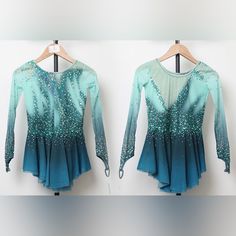 two long sleeved shirts with blue and green ombreaches on hangers