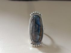 Handmade labradorite bohemian ring , you can wear this ring as a party wear ring .. Title -labradorite stone ring Stone color - blue Stone shape - oval Material - Sterling silver 925 Note - This is natural stone so shade may be little bit different .. we are giving you best quality rings on best price .. contact us for more quantity Silver Bohemian Labradorite Ring, Bohemian Silver Crystal Ring With Natural Stones, Silver Labradorite Bohemian Ring, Bohemian Silver Labradorite Ring, Silver Bohemian Crystal Ring With Cabochon, Bohemian Silver Crystal Cabochon Ring, Bohemian Oval Crystal Ring With Natural Stones, Oval Bohemian Crystal Ring With Natural Stones, Handmade Bohemian Oval Moonstone Ring