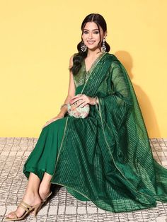 Woven design woven designA-line shapeRegular styleV-neck, sleeveless shoulder strapsCalf length with flared hemSilk blend knitted and woven fabrichas a liningComes with a dupatta Brocade Kurta, Designer Anarkali Suits, Designer Anarkali, Anarkali Suit, Bottle Green, Woven Design, Punjabi Suits, Green Silk, Jacket Style