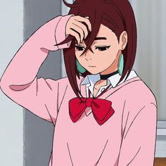 an anime character wearing a pink shirt and red bow tie with her hands on her head