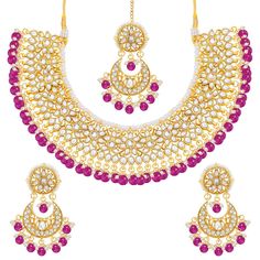 PRICES MAY VARY. Product Dimension :Necklace Length - 7.2 inch x Width - 1.7 inch, Earrings Height - 3 inch x Width - 1.7 inch, Maang Tikka Length - 6 inch x Width - 1.6 inch, Weight - 167 gms Occasion: Take your style up a notch with this handcrafted piece of jewellery; Enamelled and embellished with rhinestone, crystal, faux pearl, it is perfect for a traditional yet contemporary look Outfits: Ideal for any ethnic outfits like sarees, lehengas, gowns, bridal wear or for parties, festivals, dan Ethnic Wedding, Wedding Party Wear, Maang Tikka, Kundan Necklace, Bollywood Jewelry, Ethnic Outfits, Wear Necklaces, Kundan Necklaces, Indian Traditional