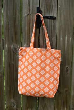 ✦✦ Orange 10 ounce cotton canvas with retro pattern.  ✦✦ Width: 15.4 inches  ✦✦ Height (length): 15 inches  ✦✦ Depth: 3.5 inches  ✦✦ Handle length: 23 inches  ✦✦ Inside pocket to put keys, mobile, etc.  ✦✦ Zipper across the top This will be sent from our Fulfillment center in the USA. Book Beach, Gallery Icon, Safari Nursery Prints, Fidget Blankets, Orange Retro, Fidget Quilt, Silver Bear, Precious Gemstones Jewelry, Bear Paws