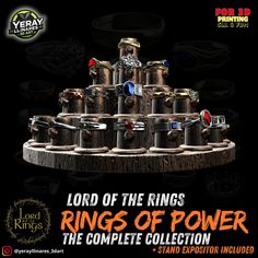 the lord of the rings rings of power collection is on display in front of a black background