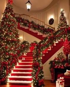 christmas decorations on the stairs and staircases are decorated with red bows, garlands and lights