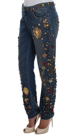 Step into a world of luxury with these exquisite Dolce & Gabbana boyfriend fit jeans, radiating charm with a blue wash and dazzling embellishments. These rare jeans are from the high-end MainLine Collection and feature crystal heart Roses, evoking the beauty of an enchanted Sicily. Perfect for fashion connoisseurs looking for a blend of sophistication and relaxed style. Material: 68% Cotton, 15% Brass, 5% Zama, 4% Crystal, 4% Plastic, 2% Elastane, 2% Glass Color: Blue wash Fly: Zipper fly and bu Heart Roses, High Heel Stiefel, Dolce And Gabbana Blue, Boyfriend Fit Jeans, Fashion Forever, Embellished Jeans, Dolce E Gabbana, Jeans Boyfriend, Boyfriend Fit