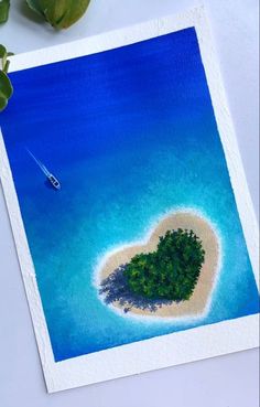 an island shaped like a heart with a boat in the water near it and some plants