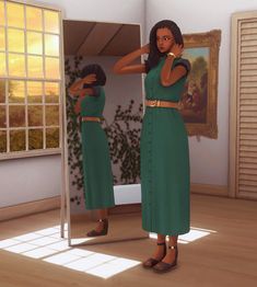 a woman in a green dress is looking at herself in the mirror and holding her head