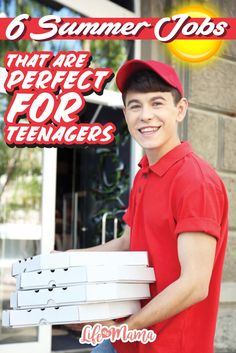 a young man is carrying several boxes in front of a storefront smiling at the camera