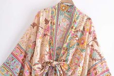 wickedafstore Alondra Kimono Beige Floral Print Beach Kimono, Cotton V-neck Kimono With Floral Print, Multicolor Floral Print Long Sleeve Kimono, Long Sleeve Kimono With Multicolor Floral Print, Long Sleeve Multicolor Floral Kimono, Chic Multicolor Floral Print Kimono, Casual Multicolor Print Kimono, Casual Summer Kimono With Paisley Print, Spring Long Sleeve Kimono With Vibrant Print