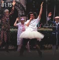 an old photo of some people dancing in front of a building with the caption tiktok