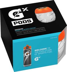 an orange and white box with the words pods on it, next to a can of gatorade air freshener concentrate