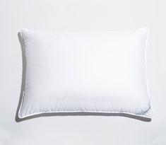 a white pillow on a gray background