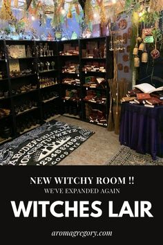 a witch themed room with lights hanging from the ceiling and an area rug on the floor