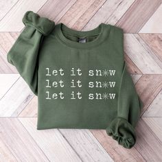 The Let it Snow, Let it Snow, Let it Snow cozy crewneck sweatshirt is perfect for the holiday season or a snow day!  I love working with custom orders!  If you have a design in mind, or have something customized already and would like it on a shirt, send me a message and we can make that happen! This item is printed with ink through a partnership with a print company.  It's not one of the hand-painted items in this shop.  Therefore, I have not personally inspected it before it's shipped, or pack Christmas Sweatshirt Ideas, Vintage Christmas Shirt, Cute Christmas Sweater, Sweatshirt Aesthetic, Cheer Shirts, Coffee Sweatshirt, College Sweatshirt, Adventure Shirt, Winter Shirts