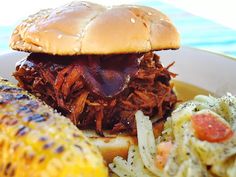 Our Most-Saved Tailgate Recipe Is So Good, More Than 2,000 Reviewers Gave It 5 Stars Slow Cooker Texas Pulled Pork, Texas Pulled Pork, Braised Pork Shoulder, Shoulder Roast, Pork Shoulder Roast, Slow Cooker Pulled Pork, Pulled Pork Recipes, Pork Sandwich, Pulled Pork Sandwich