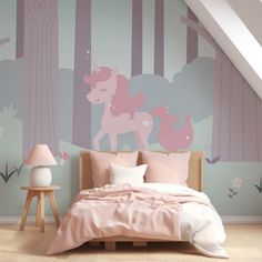 a bedroom with a pink unicorn mural on the wall next to a bed and night stand