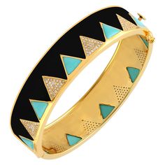 A beautiful enamel bracelet handmade in 18K gold and sterling silver. It is set in 6.95 carats turquoise and 1.22 carats of sparkling diamonds. Clasp Closure. FOLLOW MEGHNA JEWELS storefront to view the latest collection & exclusive pieces. Meghna Jewels is proudly rated as a Top Seller on 1stDibs with 5 star customer reviews. All items manufactured by us are handmade and can be customized or redesigned. Composition Size-58X58X15 MM Total Weight-42.77 Gold Weight(Gms)-2.23 Silver Weight(Gms)-36.256 Diamond Wt(Cts)-1.22 Turquoise Wt(Cts)-6.95 Luxury Southwestern Style Bangle, Luxury Turquoise Bracelets With 17 Jewels, Designer Enamel Bangle Jewelry, Elegant Turquoise Inlay Bracelet, Elegant Turquoise Bracelet With Inlay, Luxury Turquoise Bangle Bracelets, Luxury Turquoise Jewelry With Diamond Accents, Luxury Enamel Inlaid Jewelry, 18k Gold Bangle