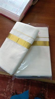 Traditional Kerala dhoti prepared by Kuthampully weavers. Fabric : Cotton Saree Color: Off White Occasion : Casual/Partywear/Festive Note: Color may very slightly due to photographic effect Wash and Care: Dry clean preferred, do not bleach Sets With Border For Puja And Festivals, Festival Puja Sets With Border Detail, Festive Sets With Border For Puja, Gold Cotton Traditional Wear With Pallu, Gold Handloom Sets For Puja, Gold Cotton Traditional Wear With Cutdana, Gold Cotton Traditional Wear With Drape, Gold Traditional Wear With Border For Puja, Gold Cotton Sets For Puja