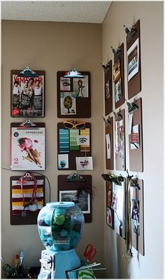 the wall is covered with many pictures and magnets