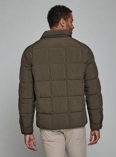 A nylon quilted puffer jacket crafted with recycled fiber insulation fill providing maximum warmth. Features front flap pocket, interior pocket, and hidden phone pocket. Snap closure on cuffs and side vents for comfort. Throw over your favorite flannel for that next-level-cozy feeling. Details Models is 6'1" and wear a size medium. Machine wash cold with similar colors, do not bleach, tumble dry low, do not iron, do not dry clean. 100% Nylon Long Sleeve Down Outerwear With Pockets, Classic Nylon Winter Outerwear, Khaki Puffer Jacket With Pockets For Cold Weather, Green Down Puffer Jacket With Pockets, Classic Winter Nylon Outerwear, Classic Nylon Outerwear For Winter, Fall Functional Quilted Puffer Jacket, Fall Quilted Puffer Jacket, Utility Nylon Outerwear With Padded Collar