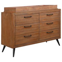 a wooden dresser with black handles and drawers