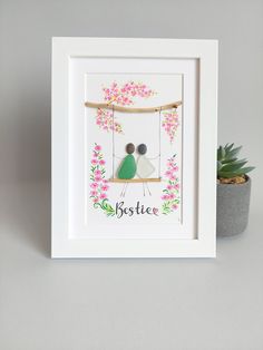 two people sitting on a swing with pink flowers in the background and text, spotiee