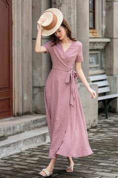 "Make a statement in this stunning deep pink linen wrap dress. The V-neckline and short sleeves create a flattering silhouette, while the wrap design allows you to adjust the fit to your liking. The dress is made from high-quality linen that is soft, breathable, and perfect for the summer season. Whether you're headed to a wedding, a garden party, or a casual brunch, this dress is sure to turn heads. DETAILS * 100% linen * Two Seam pockets * V-neck collar * No buttons, belted dress * A Line dress, Wrap dress * Above the ankle * Perfect for Summer, Spring * Wash by hand or machine with cold water, Ironing after dry * The model is 168cm (5′ 6″) tall with a 80cm (31.5\") bust, 66cm (26\") waist. She is wearing a XS. Choose CUSTOM Order if you * Need a better fit * Can't find your size in our Casual Dress For Tall Women, Wrap Around Dress Outfit, Spring Solid Color Maxi Dress With Surplice Neckline, Solid Color Maxi Dress With Surplice Neckline For Spring, Summer V-neck Dress With Surplice Neckline In Solid Color, Pink V-neck Solid Color Dress, Spring V-neck Linen Dress In Solid Color, Spring Linen V-neck Dress In Solid Color, V-neck Maxi Dress With Tie Waist