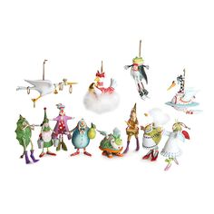 a group of figurines that are standing in front of a white background,