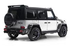 a white and black jeep with its doors open on a white background, it appears to be an off - road vehicle