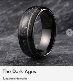 the dark ages ring is shown with black and white speckles inlaying it